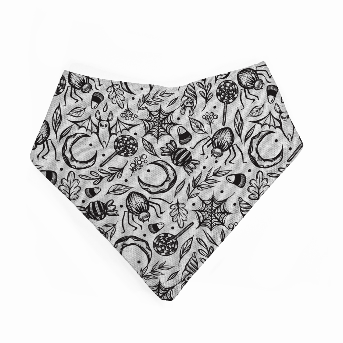 Black and white patterned bandana bib on a white background, featuring a spooky cute design with spiderwebs, bats, moons, leaves, treats.
