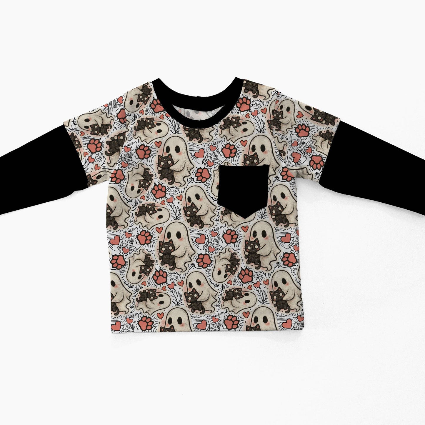 A toddler's long-sleeve shirt with black sleeves and a beige patterned body featuring cartoon ghosts, skulls, and red roses, laid flat on a white background.