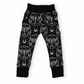 Black pants with white pattern featuring a goth / rock print with dead head moth. 