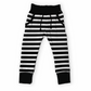 Handmade black and white striped pants with pockets on a white background