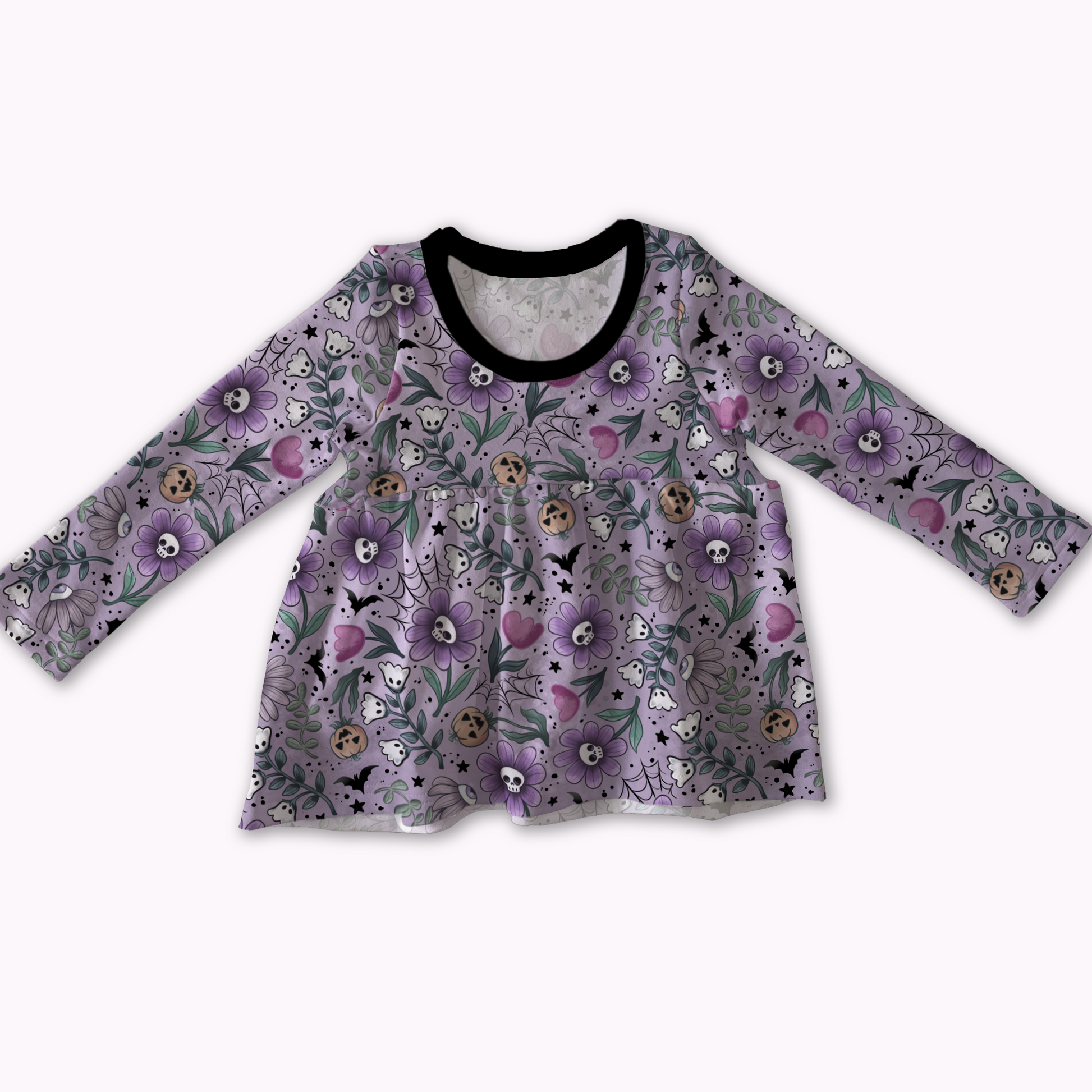 Floral patterned long-sleeve top on a white background