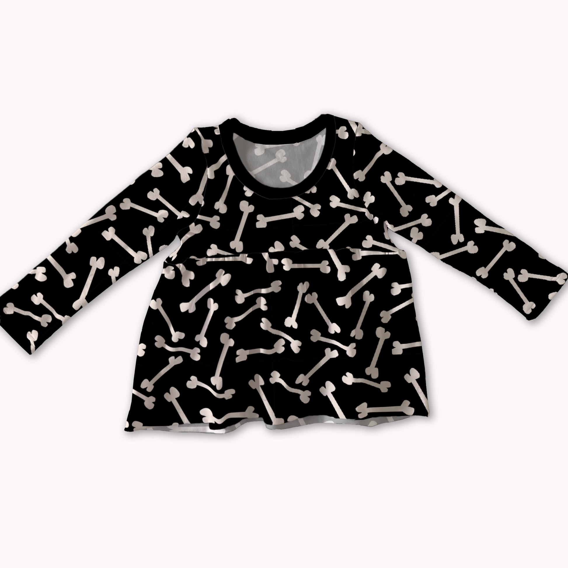 Black long-sleeve peplum shirt with white bone pattern on a white background