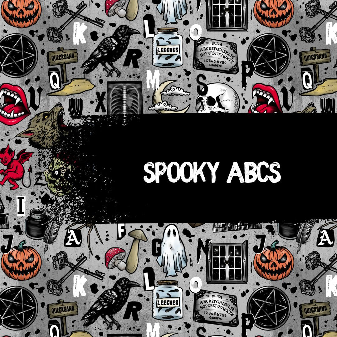 Spooky ABCs clothing print with Halloween-themed illustrations on a gray background