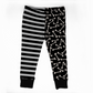 Kids leggings with 2 different legs. 
One with Black and white striped , the other with white bones on black background.